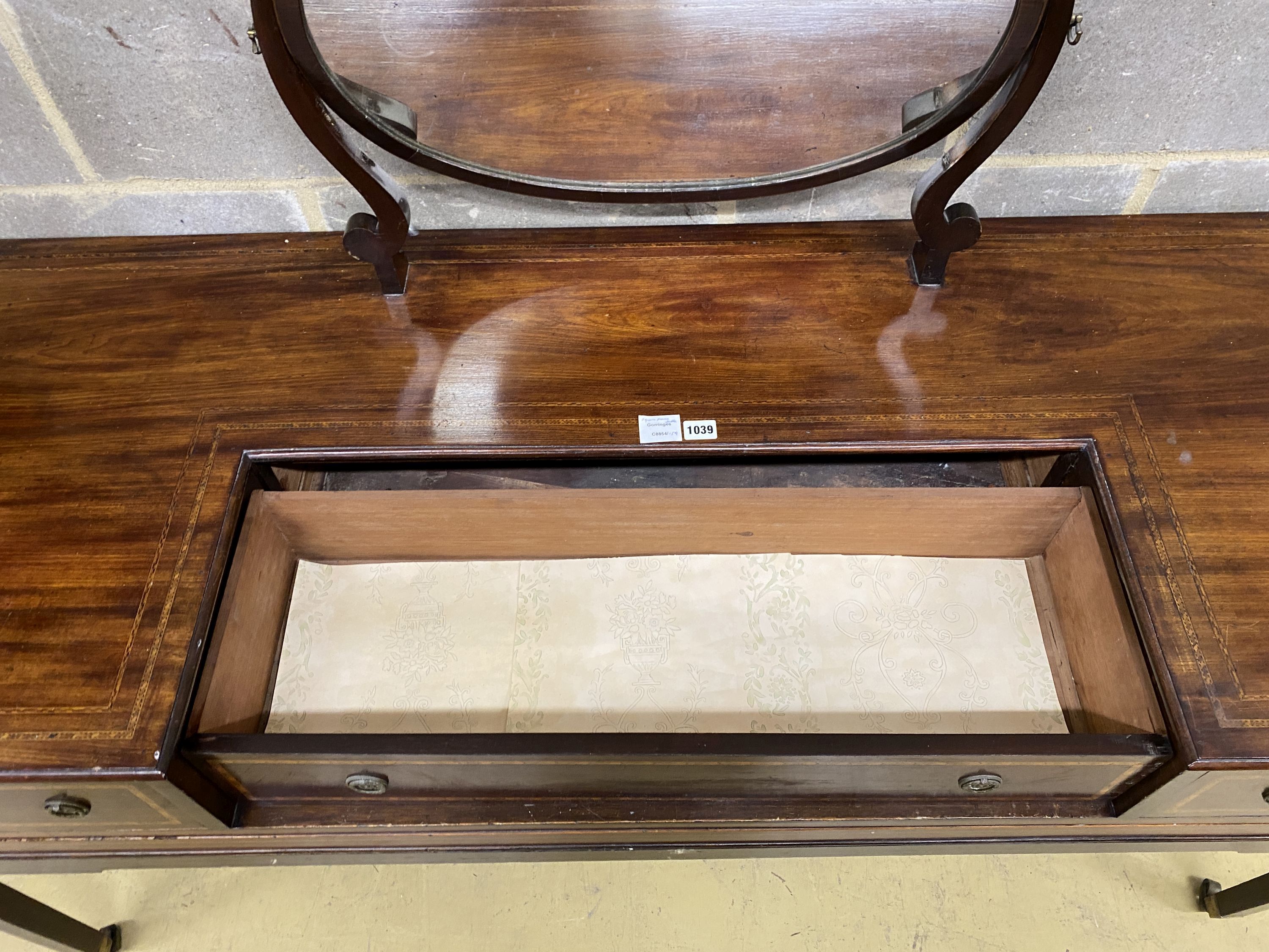 A mid 19th century mahogany dressing table, converted from a square piano